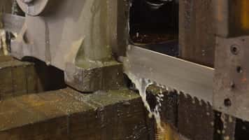 QSaw 1001 Carbide Band Saw Blade Cutting Cast Iron Transmission Housing | Foundry Cutting